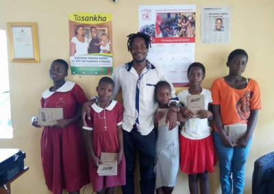 Donating school materials to school going girls in 2018.